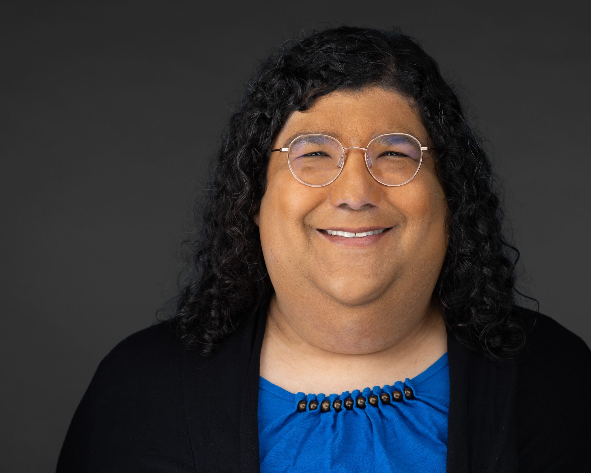 Headshot of Councilmember Jenn Hernandez in a grey background